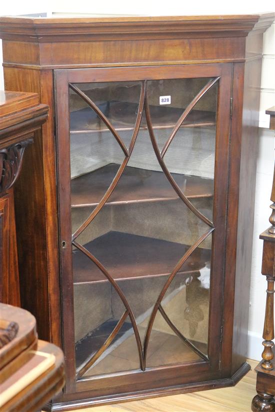 A George III mahogany hanging corner cabinet, H.150.5cm